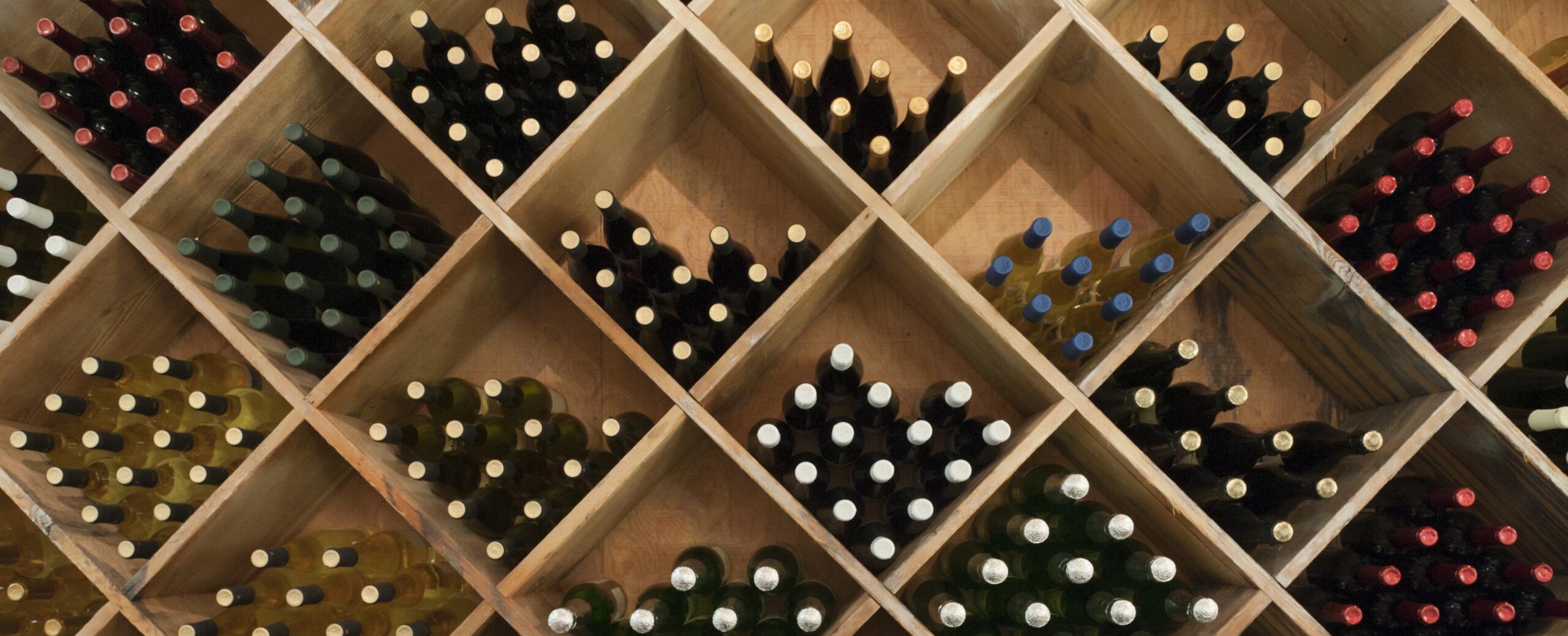 Wine Bottles on display in diagonal boxes